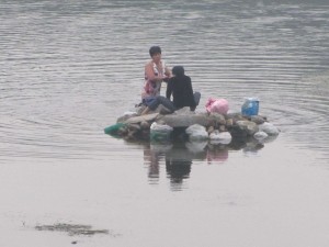 Waschtag auf dem Lijang-Fluss